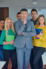 Image showing group portrait of teacher with students