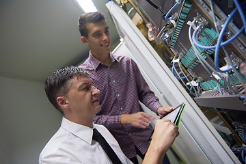 Image showing network engineers in server room