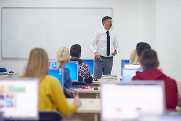 Image showing students with teacher  in computer lab classrom