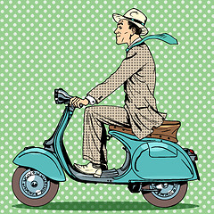 Image showing man rides on a vintage scooter