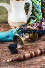 Image showing Hookah on  wooden table