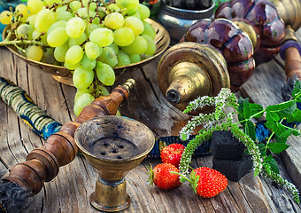 Image showing Hookah on  wooden table