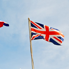 Image showing french waving flag in the blue sky british colour and wave