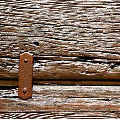 Image showing door    in italy old ancian wood and traditional  texture nail