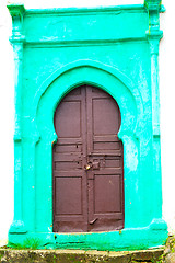 Image showing old door in morocco   wall ornate green