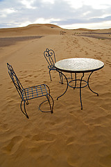Image showing table and seat in   morocco    africa yellow sand