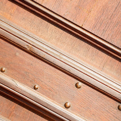 Image showing door    in italy old ancian wood and traditional  texture nail
