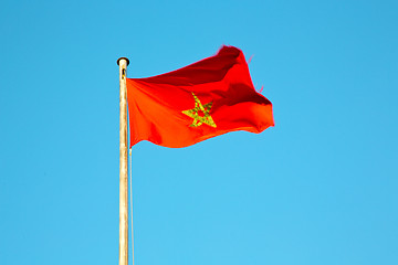 Image showing tunisia  waving flag in the blue sky  colour and battlements  