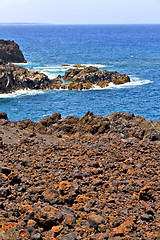 Image showing hervideros brown rock in    stone water  and summer 