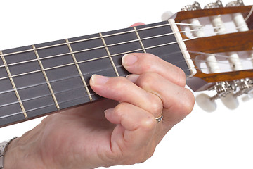Image showing Old hand and guitar isolated