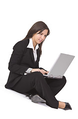 Image showing Businesswoman working on a laptop