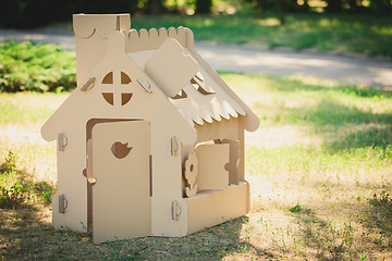 Image showing Toy house made of corrugated cardboard in the city park 