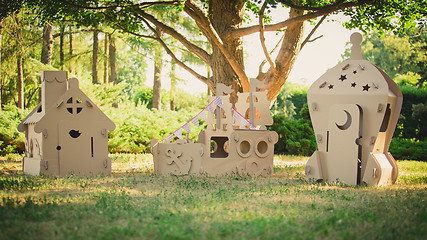 Image showing Eco-friendly toys made of cardboard ship, house and  spaceship.