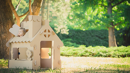 Image showing Toy house made of corrugated cardboard in the city park 