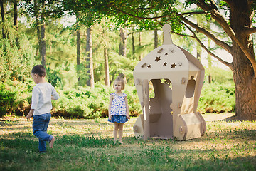 Image showing Two kids are playing in park