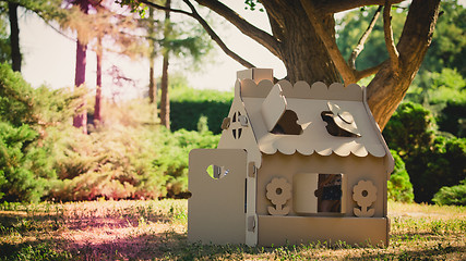 Image showing Toy house made of corrugated cardboard in the city park 