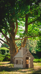 Image showing Toy house made of corrugated cardboard in the city park 