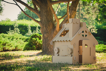 Image showing Toy house made of corrugated cardboard in the city park 