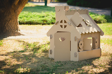 Image showing Toy house made of corrugated cardboard in the city park 