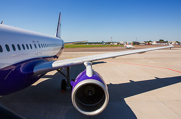 Image showing Airplane at terminal gate preparing the takeoff.