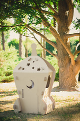 Image showing Cardboard toy spaceship in the park