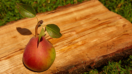 Image showing Fresh organic pear on old wood. 