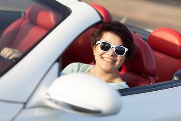 Image showing Woman Driving a Convertible