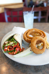 Image showing Chicken Pita Wrap and Onion Rings