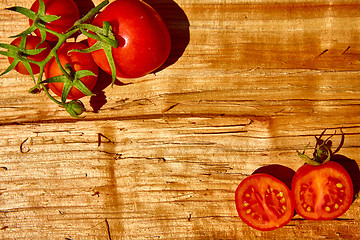 Image showing Fresh tomatoes with on wooden table