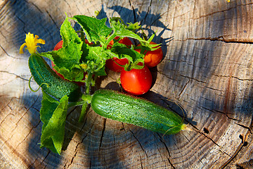 Image showing The concept of healthy eating with organic cucumber and tomatoes