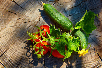 Image showing The concept of healthy eating with organic cucumber and tomatoes