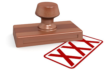 Image showing Wooden stamp xxx with red text