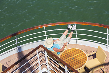 Image showing Man enjoys the sailing cruise ship