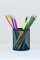 Image showing Pencils in a case on the light-coloured shelf