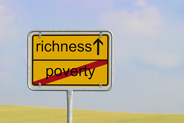 Image showing sign poverty richness