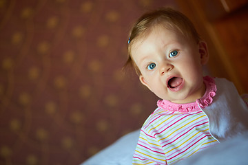 Image showing baby playing with toys at home