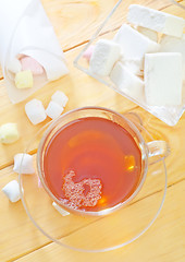 Image showing Fresh tea with candy