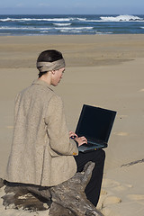 Image showing Working At The Beach