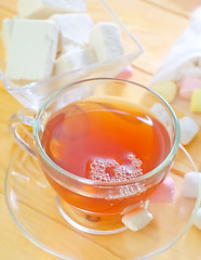 Image showing Fresh tea with candy