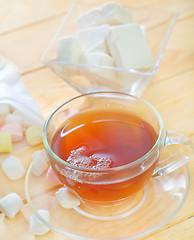 Image showing Fresh tea with candy