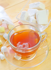 Image showing Fresh tea with candy