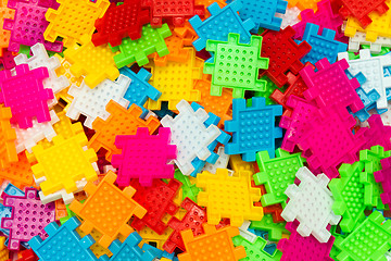 Image showing Colorful jigsaw puzzle close up.