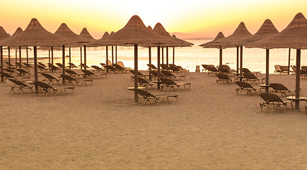 Image showing Tropical beach huts at sunrise