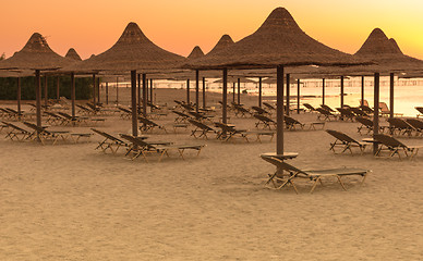 Image showing Tropical beach huts at sunrise