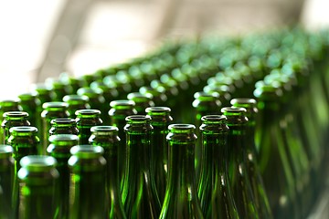 Image showing Many bottles on conveyor belt