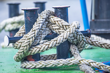 Image showing Cleat with mooring line of a trawler