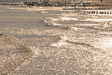 Image showing Sunrise over the Baltic Sea with groins