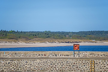 Image showing wave-breaker with spindrift