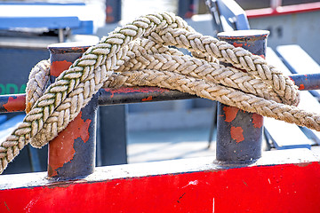 Image showing Cleat with mooring line of a trawler