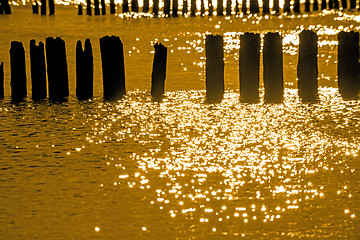 Image showing Sunrise over the Baltic Sea with groins